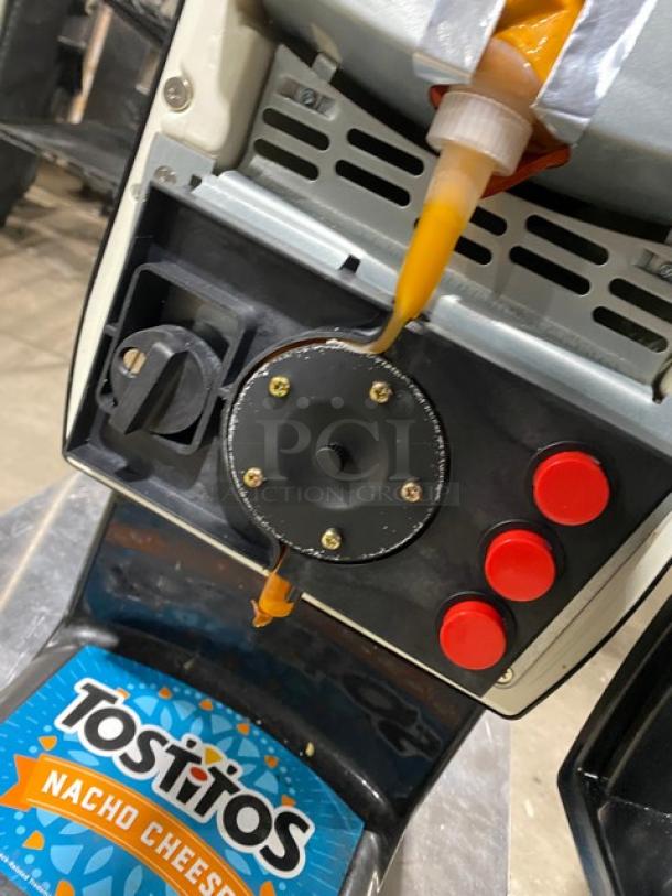 Gold Medal 5300P El Nacho Grande nacho cheese dispenser, black, electric-powered, with push-button controls, 120V.