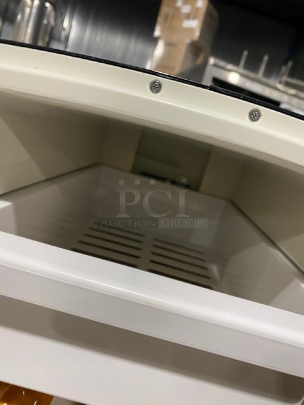 Gold Medal 5300P electric nacho cheese dispenser, black, push button, countertop model, excellent condition, 120V.