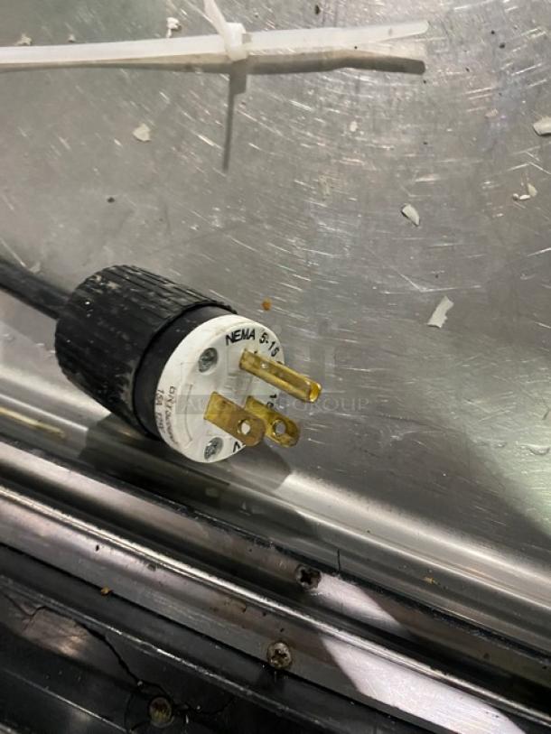 True TSID-96-3 deli merchandiser plug detail. Features NEMA 5-15P plug. 115V, 1 Phase. Model and serial not visible.