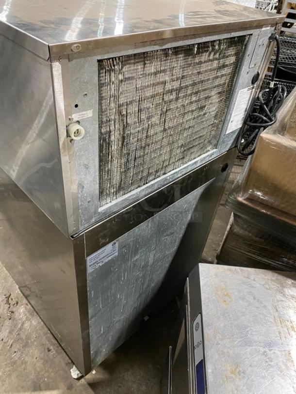 Kold-Draft GT364AC ice maker, stainless steel, air-cooled, on legs, visible wear. Model and power details on label.