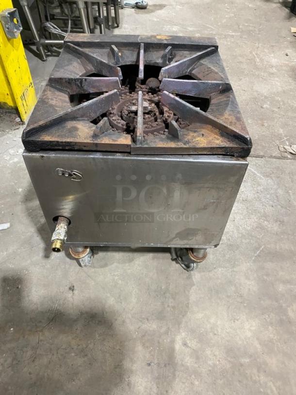 Commercial stainless steel gas-powered single burner stock pot range on casters, used condition, suitable for heavy-duty cooking.