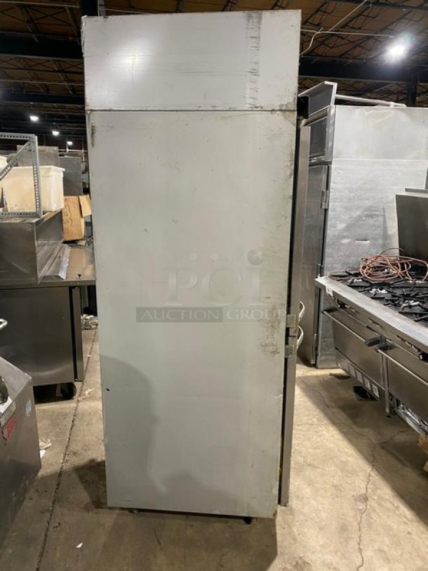 Beverage-Air Horizon Series stainless steel half-door refrigerator, model HR1-1HS, on casters, with poly-coated wired rack.