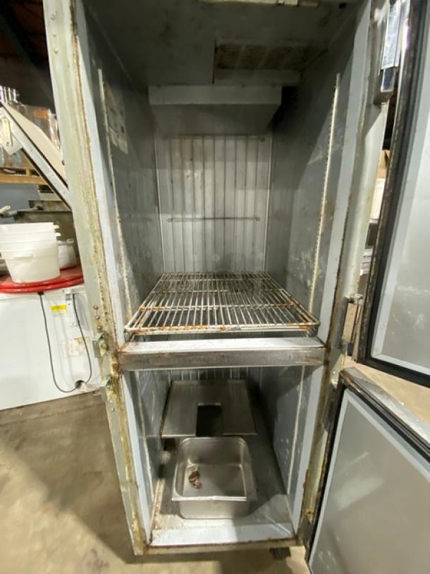 Beverage-Air Horizon Series HR1-1HS commercial refrigerator, stainless steel, solid half-door, poly-coated wire rack, on casters, visible interior wear.