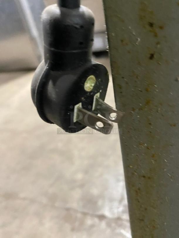 Close-up of a power plug for the Beverage-Air Horizon Series HR1-1HS refrigerator. Plug has two prongs, 115V, 1 Phase.