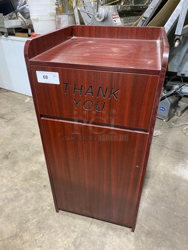 Commercial wooden waste receptacle cabinet with "Thank You" engraving, in good condition. Features include enclosed design, numbered label indicating #68.