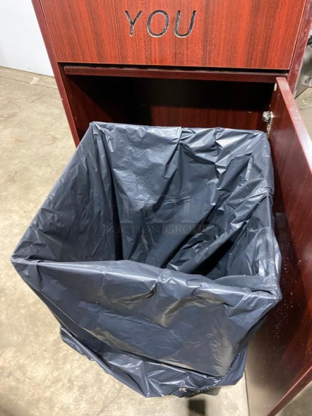Commercial wooden trash cabinet with "Thank You" design, showing open waste receptacle. Good condition, sturdy construction.