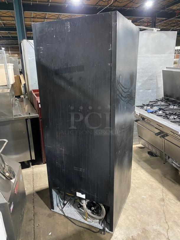 Beverage-Air MT27 commercial black single glass door merchandiser refrigerator, features poly coated wired rack, 115V, 1 Phase, SN: 8585160.