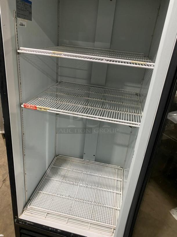 Beverage-Air MT27 commercial glass door refrigerator, three poly-coated shelves, clean interior, 115V, Model: MT27, SN: 8585160.