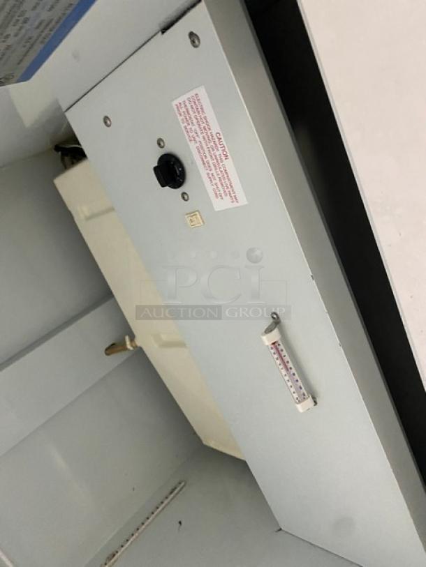 Beverage-Air MT27 commercial refrigerator interior, showing control panel and poly-coated wire rack. Model SN: 8585160, 115V, 1 phase.