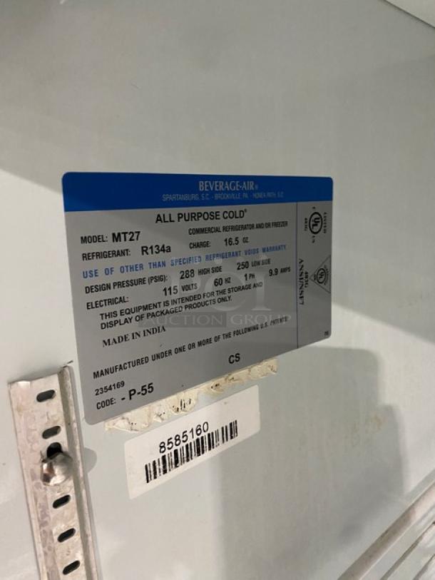Beverage-Air MT27 commercial refrigerator label displaying model, refrigerant type, and specifications. SN: 8585160.