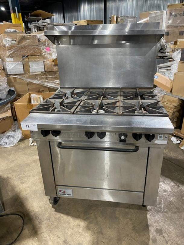 Southbend model X336D stainless steel 6-burner range/oven combo with backsplash, overhead salamander shelf, and wired oven rack.