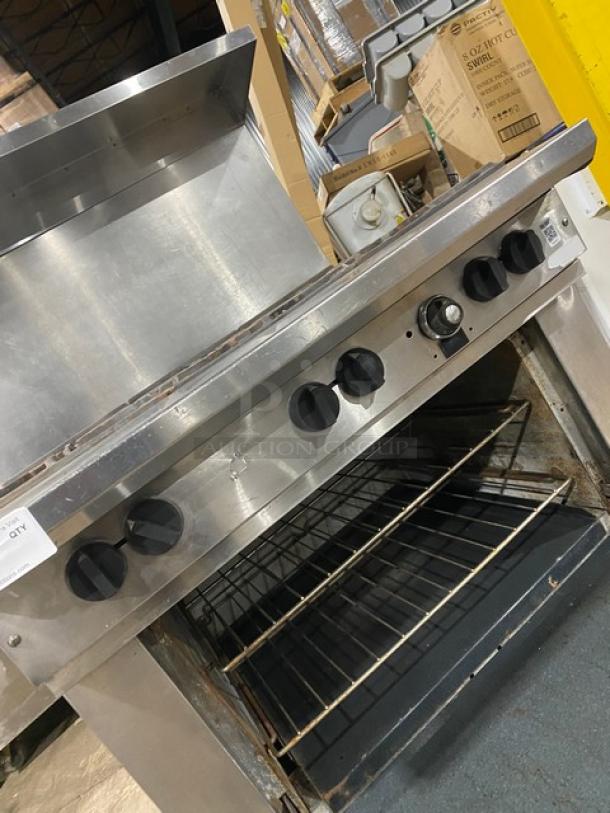 Southbend stainless steel 6-burner range/oven, model X336D, with back splash, overhead salamander shelf, and wired oven rack.