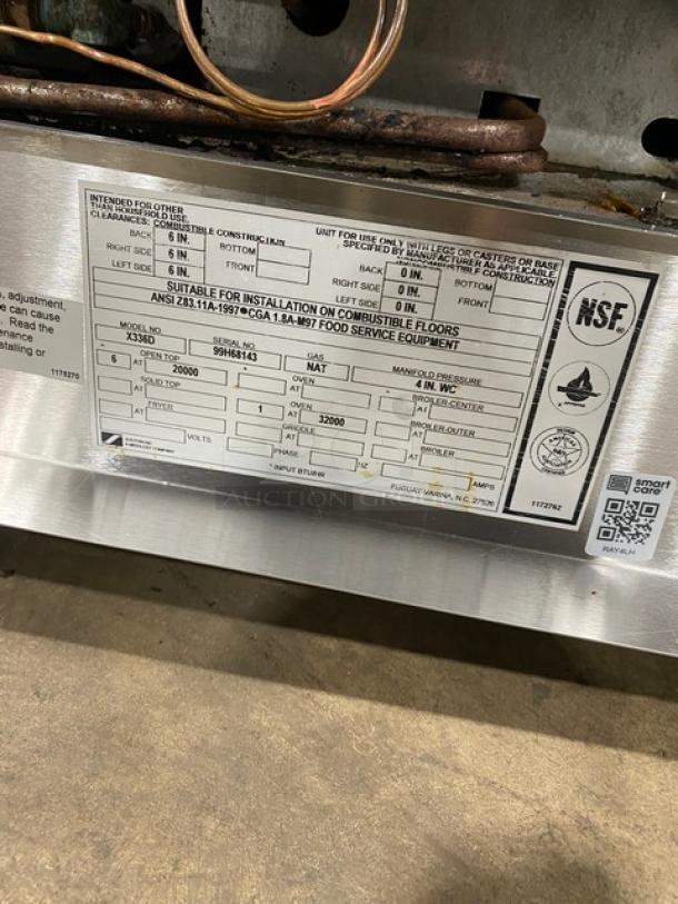 Southbend stainless steel gas range/oven, model X336D, with 6 burners, backsplash, salamander shelf, and wired oven rack.