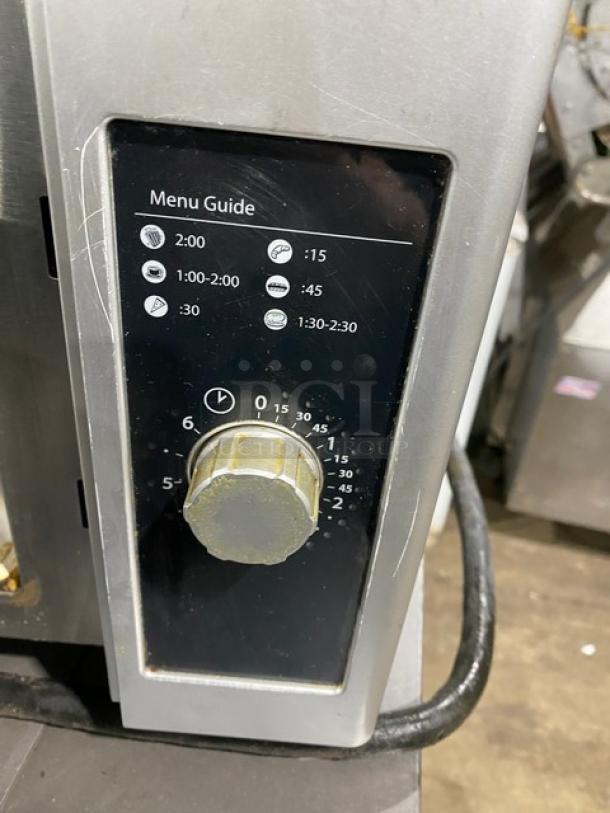 Amana RMS10DS stainless steel commercial microwave oven, dial timer, menu guide, 120V, used condition.