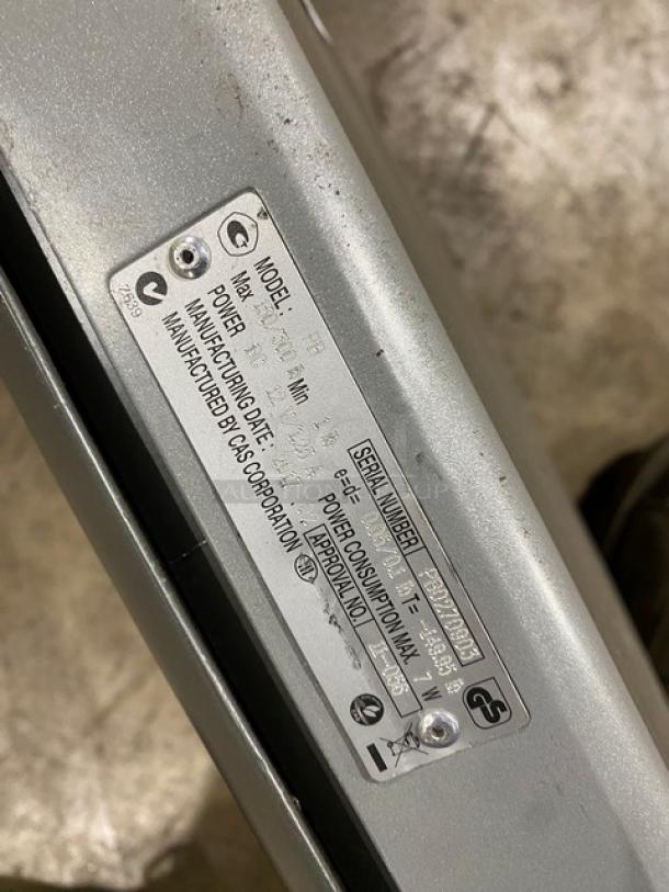 CAS Commercial Electric Bench Scale, Model PB, Serial PB0270903, on legs, capacity 150/300 lbs, visible label details.