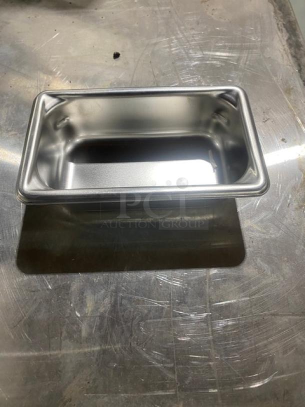 New Vollrath Super Pan-V Series stainless steel 1/9-size, 2" deep anti-jam steam table pan, model 30922.