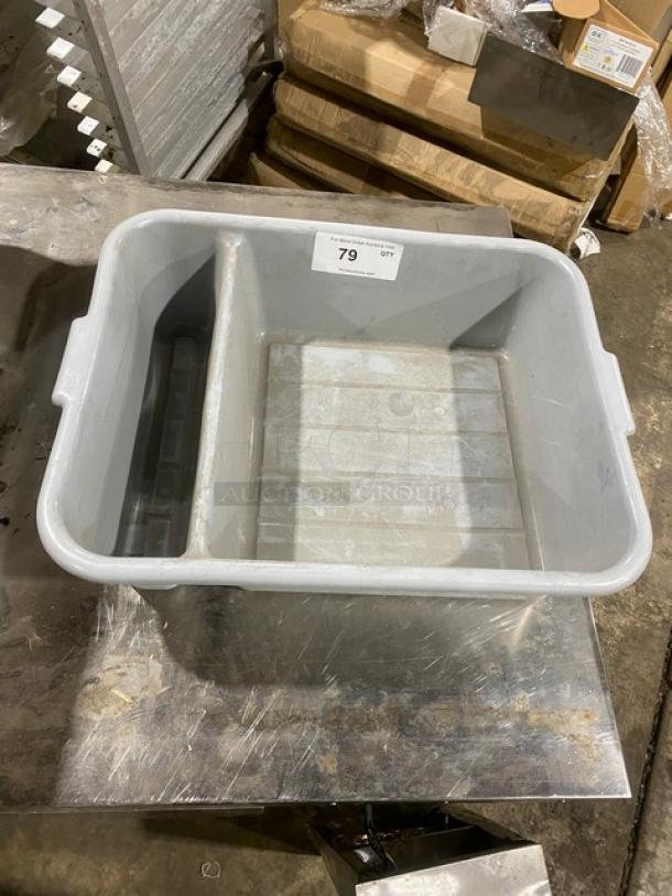 Commercial gray divided bus tub with two compartments. Durable plastic construction, slightly used condition. Tag reads "79 QTY."