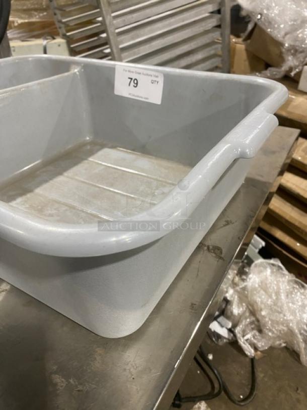 Commercial soft gray divided bus tub in good condition, labeled "79 QTY." Durable plastic, ideal for restaurant use.