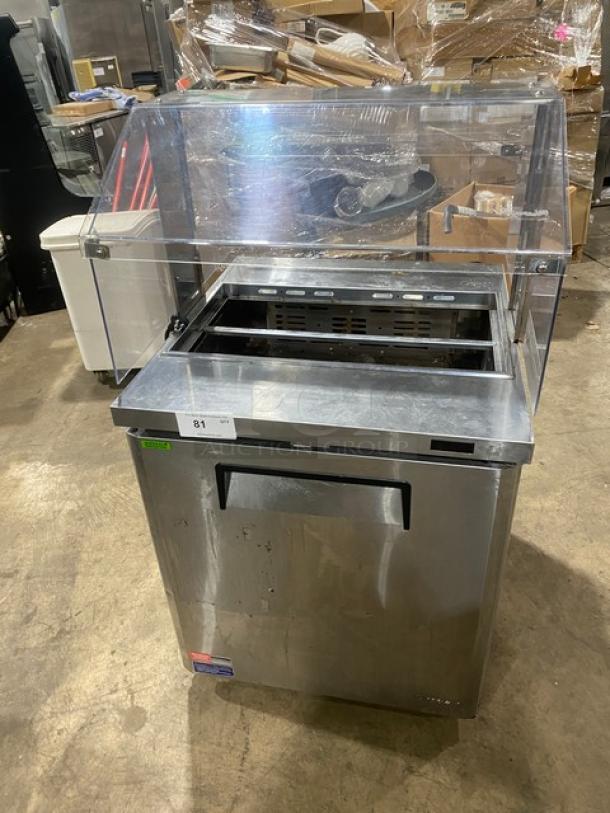 Turbo Air MST-28-N-711S stainless steel refrigerated prep table with sneeze guard, poly-coated rack, 115V, single door.