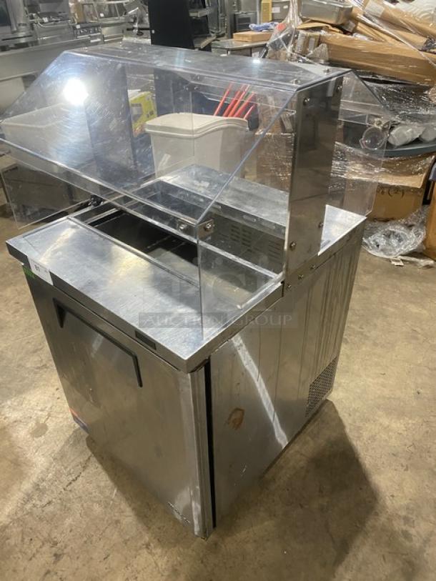 Turbo Air MST-28-N-711S stainless steel refrigerated prep table with sneeze guard, poly-coated wire rack, 115V, 1 phase.