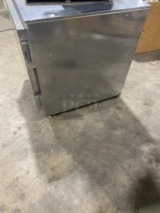 Beverage-Air UCR27A stainless steel undercounter refrigerator, solid single door, poly coated rack, on casters.