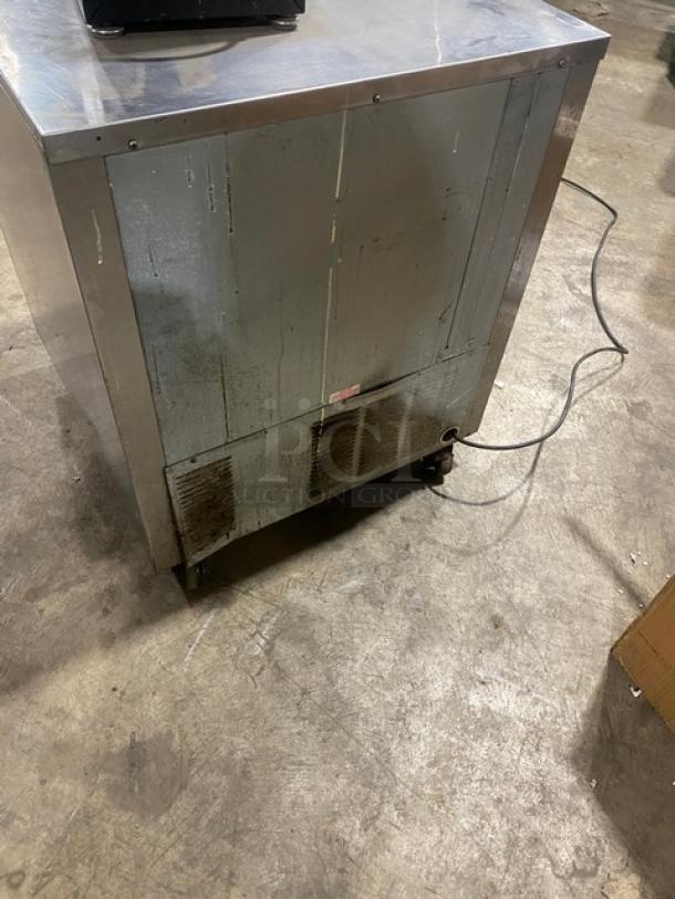 Beverage-Air UCR27A stainless steel undercounter refrigerator with poly-coated rack, on casters, model SN 5305931, 115V.