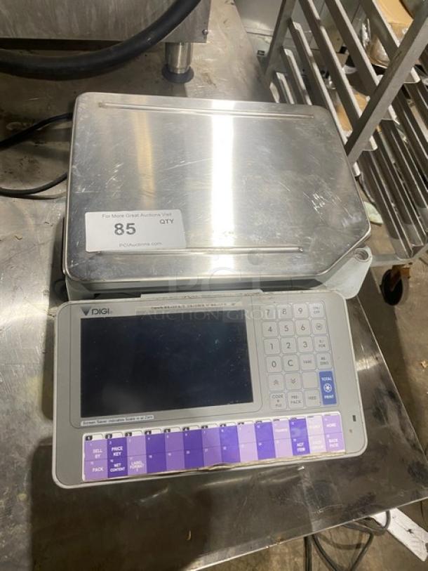 Digi SM-5000 retail scale, stainless steel, electric countertop model with display and keypad, on legs, good condition.