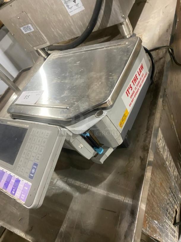 Digi SM-5000 stainless steel electric retail scale, on legs, with digital keypad and display, in good condition.
