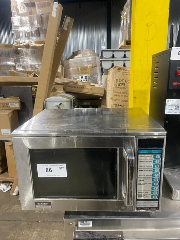 Sharp R22GTF commercial stainless steel countertop microwave oven with digital control, model SN: 109550, 120V, in used condition.