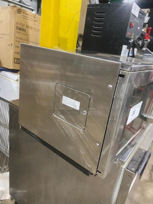 Sharp R22GTF commercial stainless steel countertop microwave oven with digital controls, 120V, good condition.