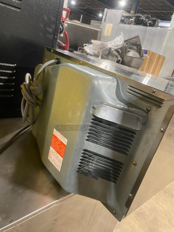 Sharp R-22GT-F stainless steel commercial electric countertop microwave, digital controls, 120V, visible wear, SN: 109550.