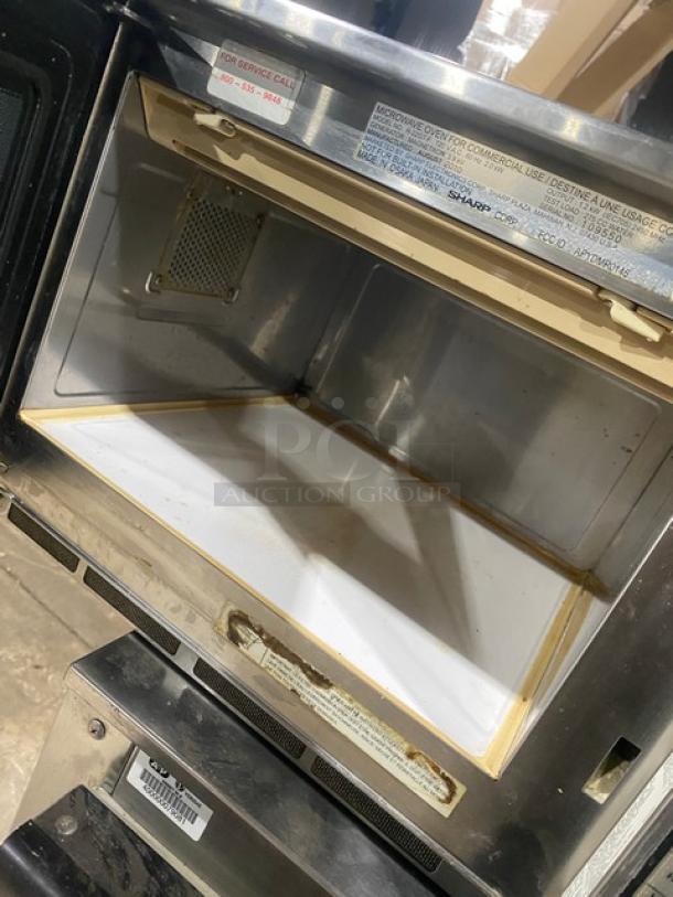 Sharp R-22GT-F stainless steel commercial microwave oven, digital controls, 120V, model R22GTF, open interior view.