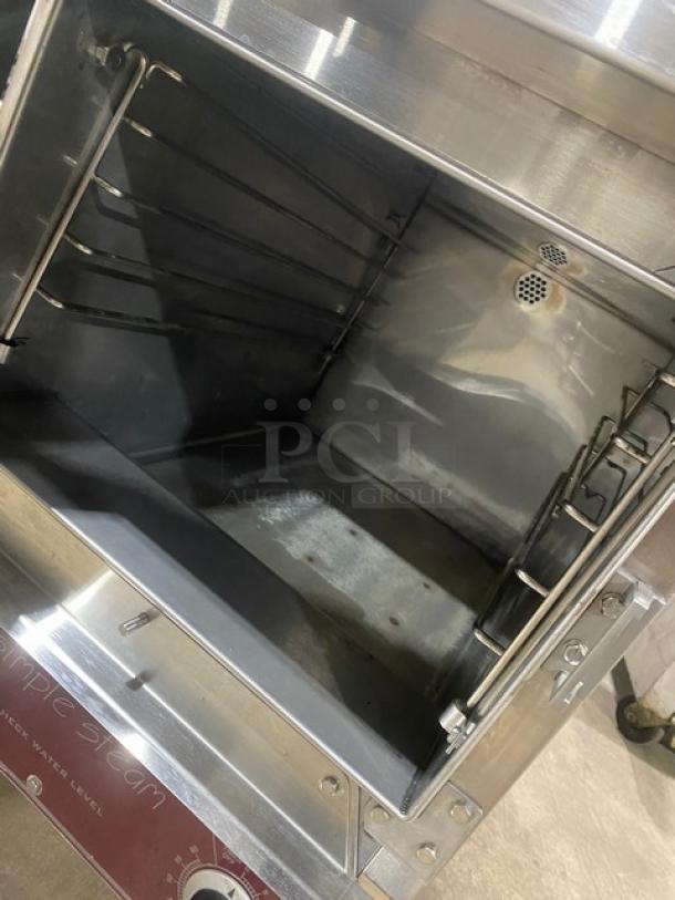 Southbend EZ3 Simple Steam Series stainless steel electric countertop steamer, model EZ-3, 208V, 3 phase, on legs, open door view.