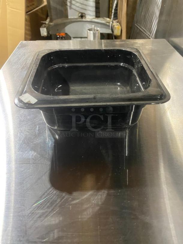 Cambro Camwear Series black 1/6-size 2.5" deep food pan, new condition, commercial-grade, durable plastic.