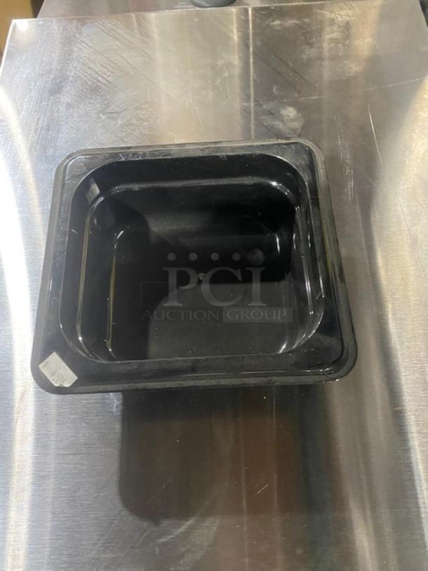 New Cambro Camwear Series black food pan, 1/6-size, 2.5" deep, commercial grade.