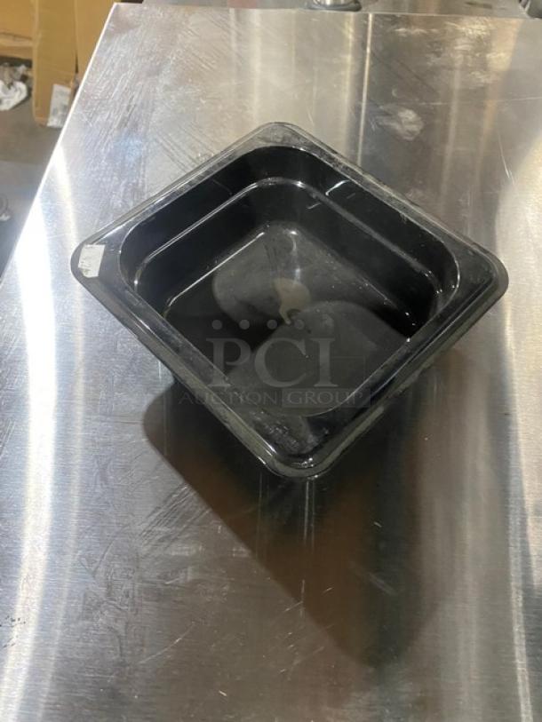 NEW Cambro Camwear Series black 1/6-size food pan, 2.5" deep, commercial-grade. Appears in excellent condition.