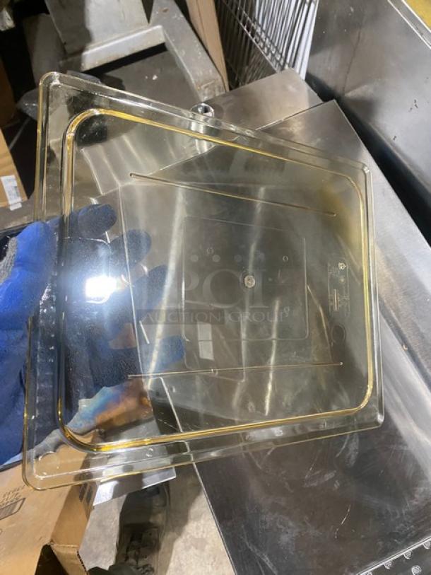 NEW Cambro commercial amber high-heat 1/2-size food pan cover lid, transparent with corner slots, durable, pristine condition.