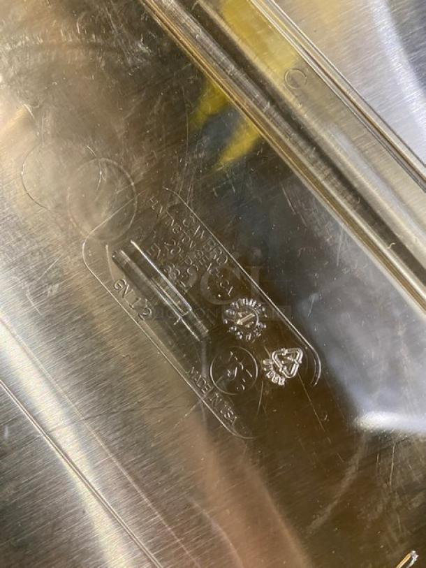 NEW Cambro amber high-heat 1/2-size food pan cover. Features embossed logo and recycling symbols. Pristine condition.