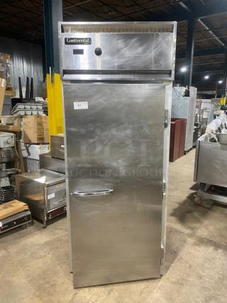 Continental Commercial Stainless Steel Single Door Reach-In Warmer, solid door, brushed finish, well-maintained condition, model label visible.