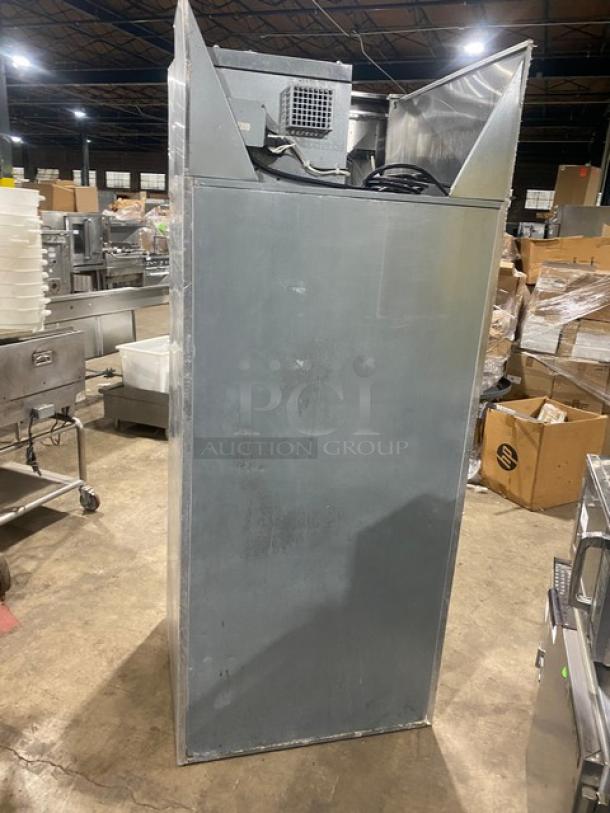 Continental commercial stainless steel single door reach-in warmer, vertical design, used condition, power cables visible.