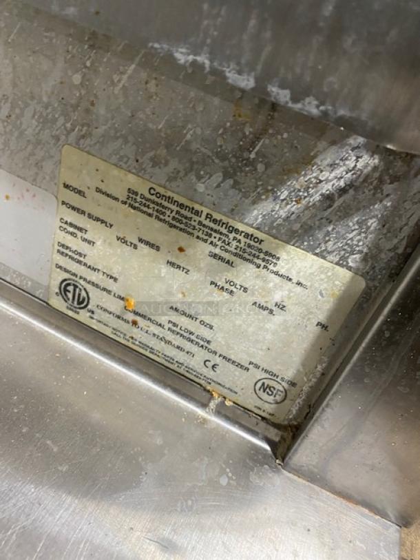 Continental Commercial Stainless Steel Single Door Warmer with visible label. Used condition, features solid construction.