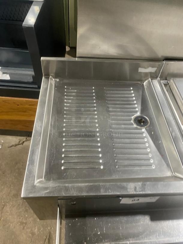 NBR LD1218 stainless steel cocktail station with ice bin, double speed rail, underbar liquor display, and left drain board.