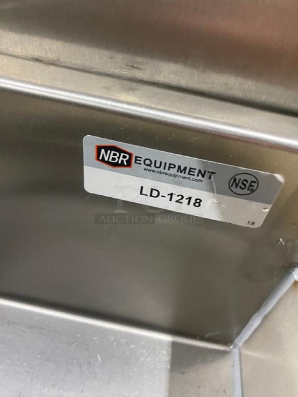 NBR LD-1218 stainless steel cocktail station with ice bin, double speed rail, liquor bottle display, left drain board.