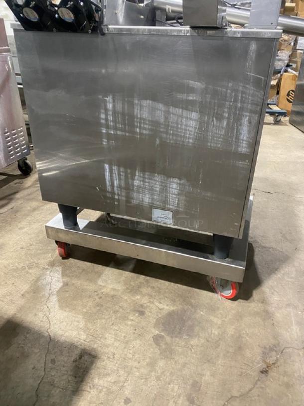 Rational Self Cooking Center 5Senses combi oven on casters. Stainless steel, natural gas, Energy Star certified, built-in pan slides.