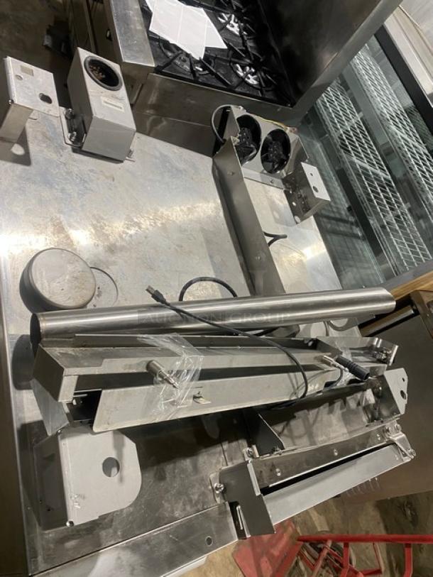 Rational Self Cooking Center 5Senses combi oven in stainless steel, natural gas, Energy Star certified, with pan slides, on legs and casters.