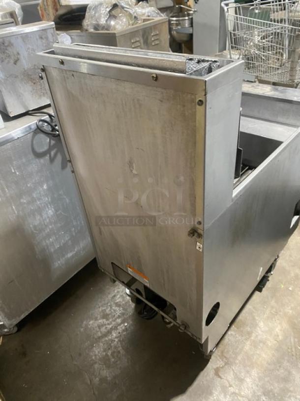 Pitco Solstice Supreme SSH75-JS stainless steel fryer, natural gas, 75 lb. capacity, with backsplash, basket hanger, on casters.