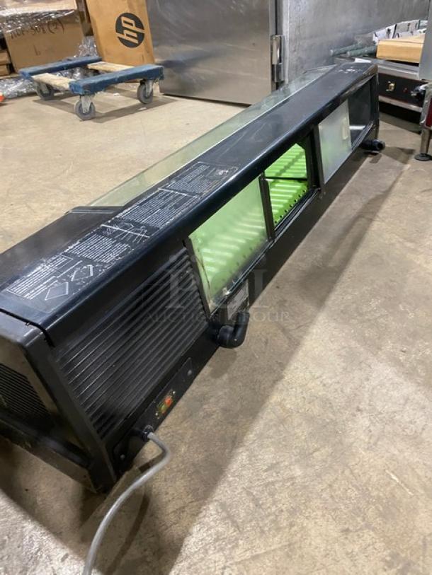 Hoshizaki 60" refrigerated sushi display case, model HNC-150AA-R, black curved glass, rear sliding doors, 115V, used condition.