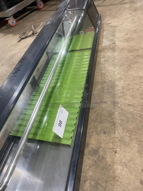 Hoshizaki commercial sushi merchandiser, model HNC-150AA-R, with black curved glass, rear sliding doors, 115V, excellent condition.