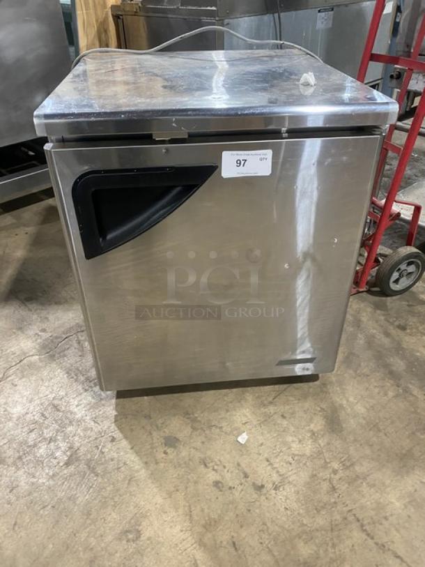 True TUF-28SD stainless steel undercounter worktop freezer, single door, poly-coated wire rack, on casters, commercial use.