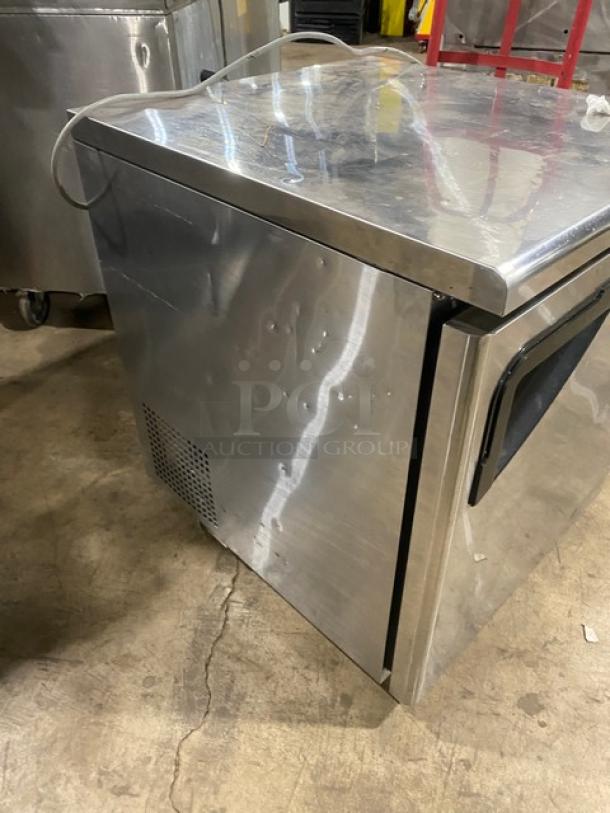 True TUF-28SD stainless steel single door undercounter freezer on casters, includes poly-coated wired rack, 115V.